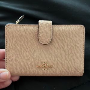 nude coach wallet